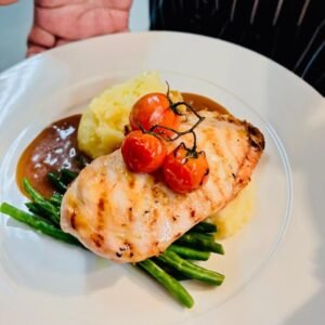 Grilled chicken, garlic green beans, creamy mash, tarragon sauce